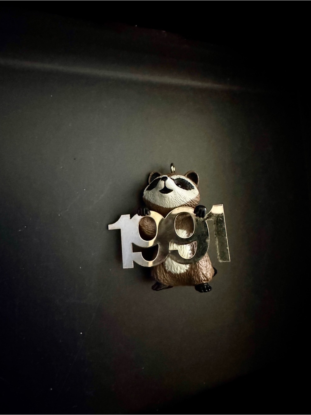 Racoon ornament with the Label Red and Green Hallmark Collector Ornament Box